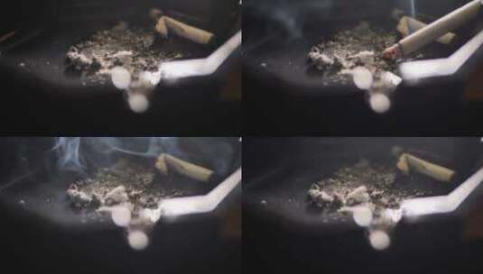 烟灰缸上的烟高清在线视频素材下载