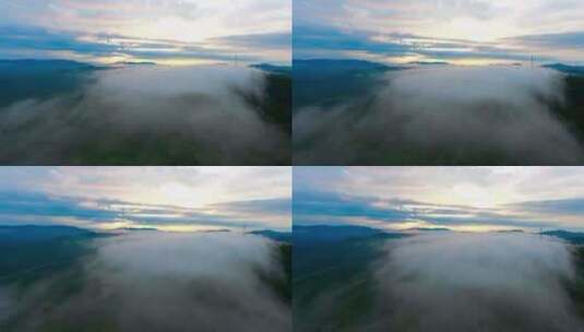 航拍云雾在热带雨林的山间流动高清在线视频素材下载