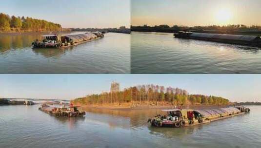航拍夕阳河道湖泊运输船只行驶码头货船高清在线视频素材下载
