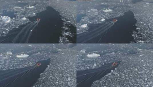 黄道十二宫摩托艇在南极冰上航行。空中跟踪高清在线视频素材下载