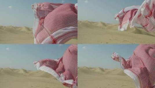 在沙漠中随风飘动的彩色毯子高清在线视频素材下载