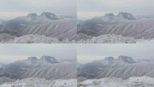 航拍男人站在雪后的大瓦山大圆包观景台高清在线视频素材下载