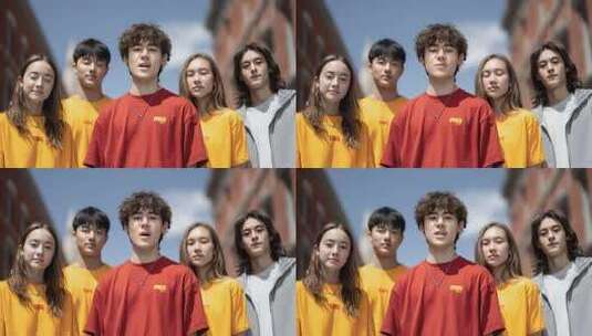 一群充满活力的年轻人在城市中合影高清在线视频素材下载