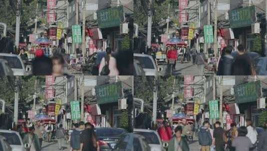北京胡同繁忙街道上的行人与商铺高清在线视频素材下载