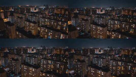 航拍城市夜景公寓楼灯光万家灯火高清在线视频素材下载