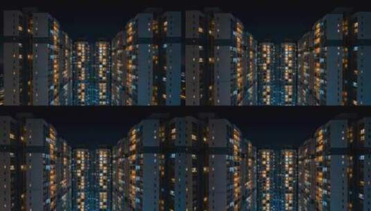 航拍城市夜景公寓楼灯光万家灯火高清在线视频素材下载