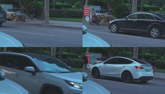 街道边电动车摊与行驶汽车高清在线视频素材下载