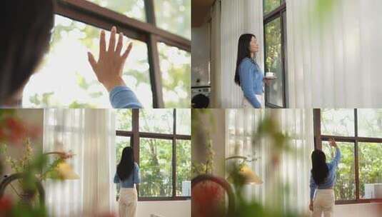 美女在家喝咖啡拉窗帘触摸阳光高清在线视频素材下载