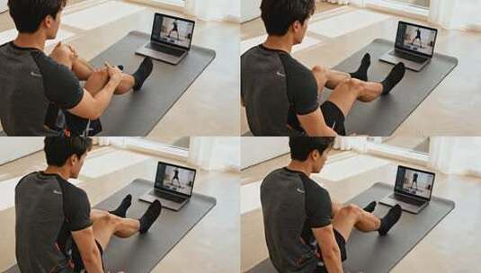居家男性观看电脑在线健身课程运动视频高清在线视频素材下载