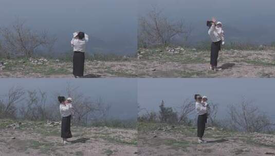 女子山顶眺望远方景色高清在线视频素材下载