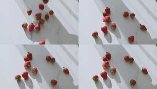 掉落在桌面上的草莓高清在线视频素材下载