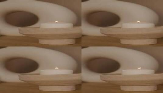 在陶瓷烛台里点燃的蜡烛竖屏高清在线视频素材下载