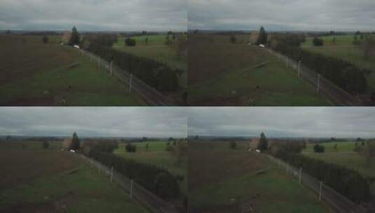 无人机拍摄的草原与道路高清在线视频素材下载