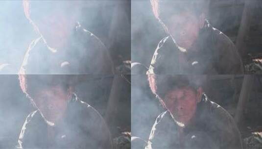 中国老人在烟雾中高清在线视频素材下载