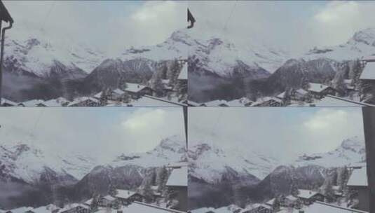 小镇上方的雪山高清在线视频素材下载