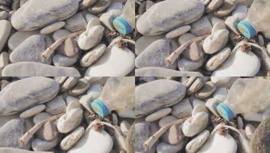 躺在海滩上的塑料瓶高清在线视频素材下载