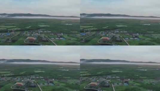航拍内蒙边塞村庄清晨朝阳云雾高清在线视频素材下载