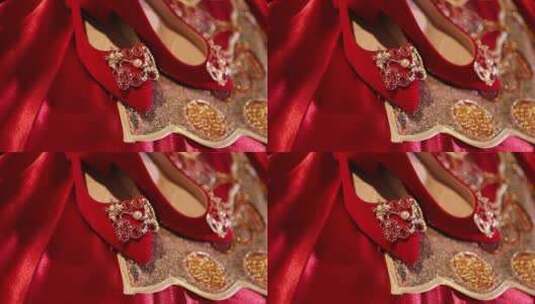婚礼晨拍红色婚鞋放在秀禾服上高清在线视频素材下载