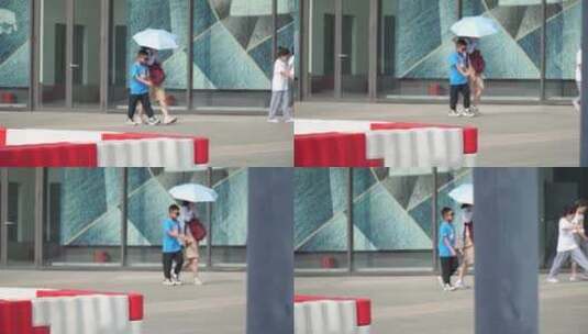 夏季打伞的行人遮阳伞高清在线视频素材下载
