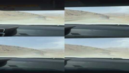 沙漠汽车行驶中风沙扬起高清在线视频素材下载
