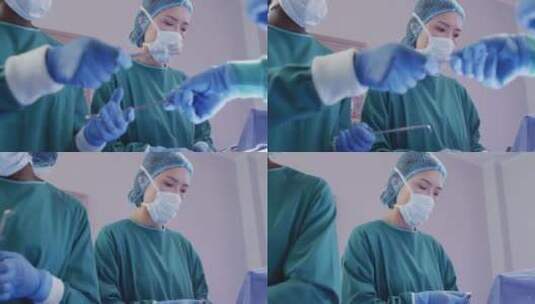 三个准备手术的主刀医生在传递刀具特写镜头高清在线视频素材下载