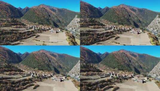 川西秋天的山谷和藏族村庄航拍高清在线视频素材下载