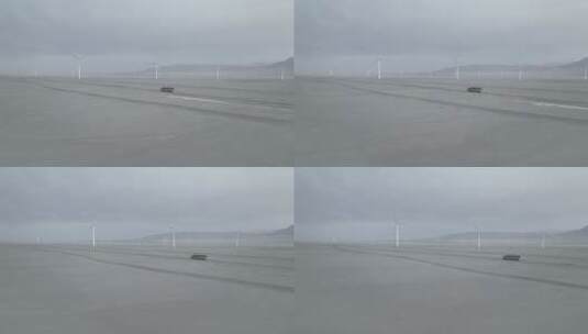 4k航拍冷湖夕阳下的大风车高清在线视频素材下载