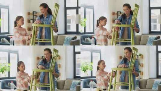 妈妈和女儿用海绵打磨椅子高清在线视频素材下载