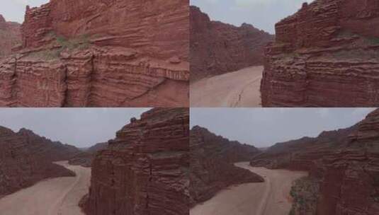 航拍越野车行驶在新疆温宿大峡谷中高清在线视频素材下载