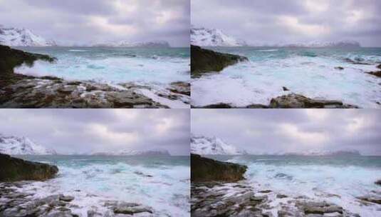 雪山海浪拍打礁石高清在线视频素材下载
