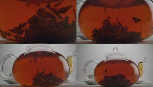 茶泡在茶壶中的金棕色茶饮料中旋转高清在线视频素材下载