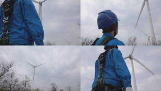 工人风机下行走工人风机检修巡检风电能源高清在线视频素材下载