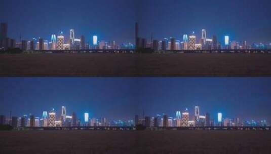 杭州城市建筑风景与高铁同框夜景高清在线视频素材下载
