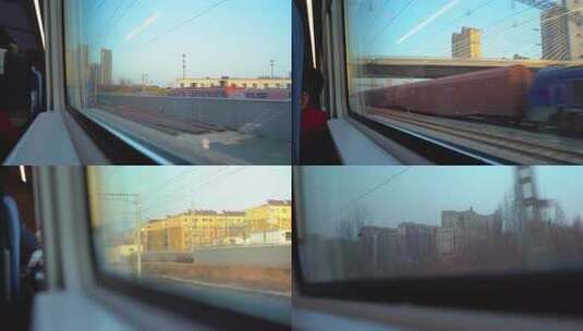 火车车厢内窗外列车与城市景象高清在线视频素材下载