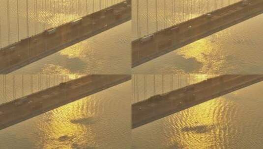 航拍大桥及江面金色光影高清在线视频素材下载
