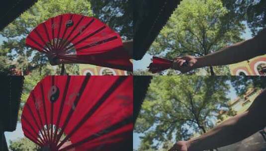 僧人在寺庙里练武 扇子特写高清在线视频素材下载