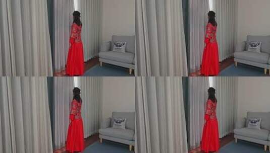 美丽古装女孩拉开窗帘让阳光洒进来高清在线视频素材下载