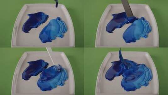 调色板上蓝色颜料特写高清在线视频素材下载