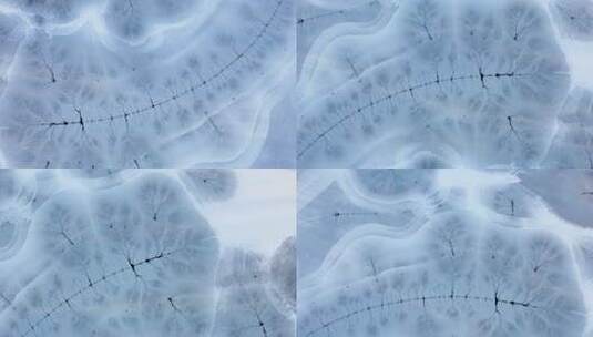 4K冬天冰封的湖面河面冰冻期航拍视频高清在线视频素材下载