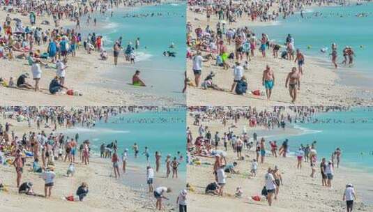 海南省三亚市大东海旅游区冬季沙滩游客延时高清在线视频素材下载