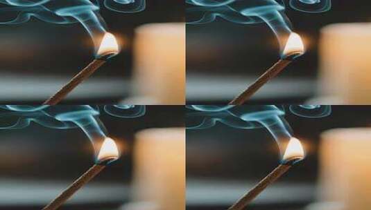 燃烧的火柴与升腾的烟雾高清在线视频素材下载