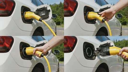 新能源电动汽车充电拔枪特写场景高清在线视频素材下载