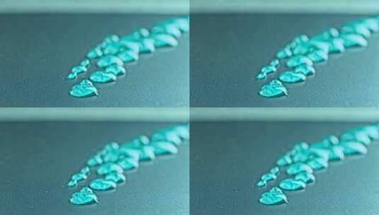 蓝色水滴微距特写高清在线视频素材下载