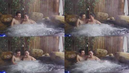 情侣在温泉中享受放松时光高清在线视频素材下载