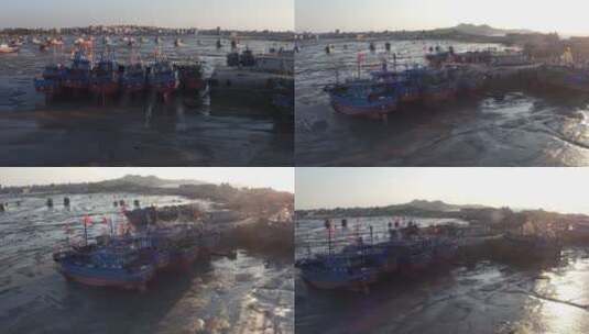 退潮后搁浅的渔船日出海洋航拍高清在线视频素材下载
