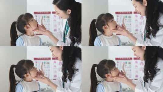 年轻女医生给小女孩检查身体高清在线视频素材下载
