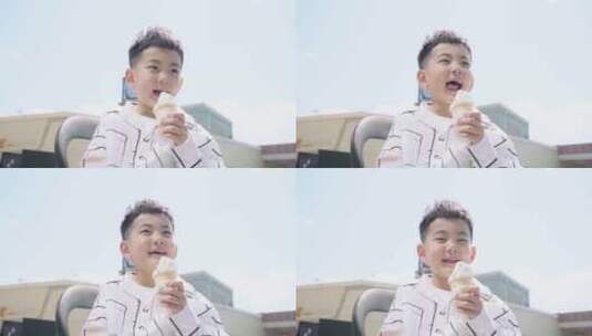 快乐的小男孩吃冰淇淋高清在线视频素材下载