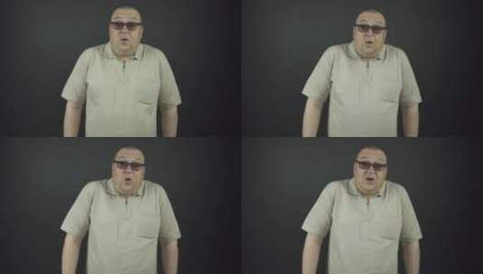 戴棕色眼镜的胖子表现出惊讶的情绪高清在线视频素材下载