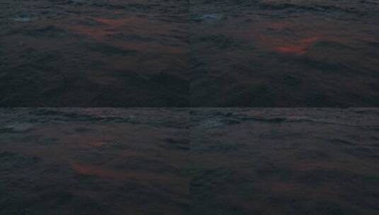 红色日落光线反射出的海浪高清在线视频素材下载