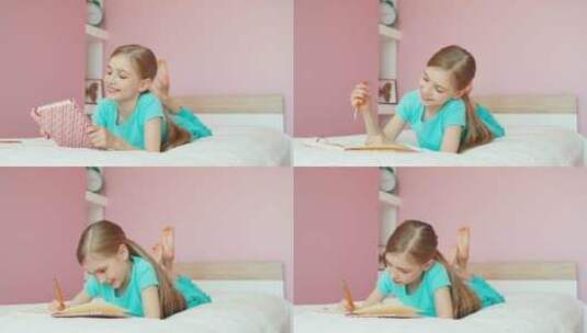 女孩拿着一个笔记本躺在床上高清在线视频素材下载